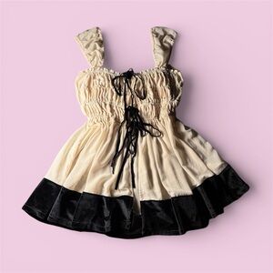 Cream and Black Sleeveless Dress